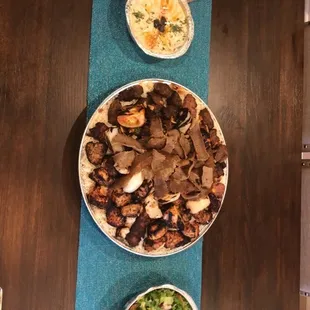 Mixed party platter, hummus, bread and salad (also comes with a yogurt sauce)