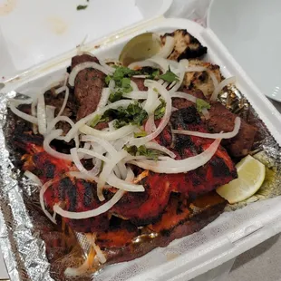 kebab king grill with onions and lime