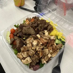 Chicken and lamb bowl! Soooo good! Ask for extra sauces on the side.