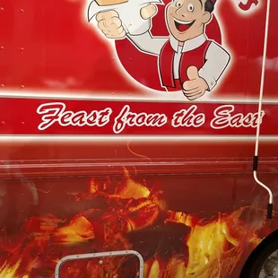 a man holding a hot dog