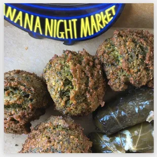 Falafels and grape leaves.