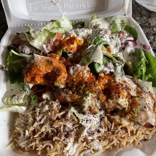 Absolutely delicious salmon platter with salad and brown rice