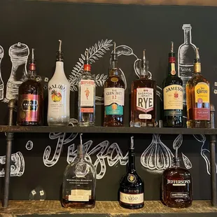 We have draft beer and and wine and cocktails in-house. And in Baltimore you can order bottled wine and 6-packs of beer delivered!