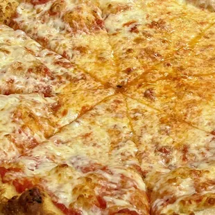 Our classic cheese pizza fresh our of the stone-bake oven