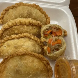 Pastel aka indonesian empanada Inside have carrot, egg, noodle, and beef serve with peanut sauce aka sambal.  Must try!