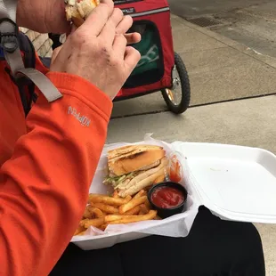 a woman eating a sandwich
