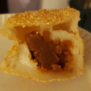 Interior of sesame ball with lotus paste ($5), vegan by default. Super tasty. Great texture.