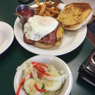 Breakfast burger with homemade fries and slaw $9.95  It was fantastic!