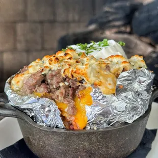 Loaded Baker behemoth baked potato with steak