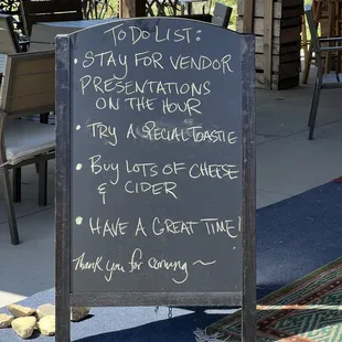 a blackboard with a list of events