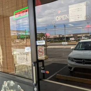 a car parked in front of the store
