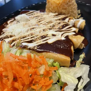 Mole Flautas with rice and salad. Under $8