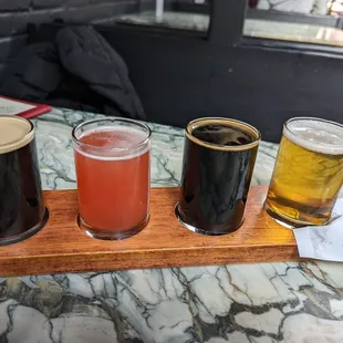 Beer flights (nitro cold brew, jazz chickens sour, berserker stout, and the Prague pilz)