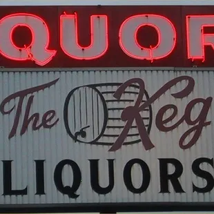 a neon sign for liquors