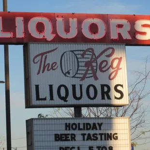 a sign for a liquor bar