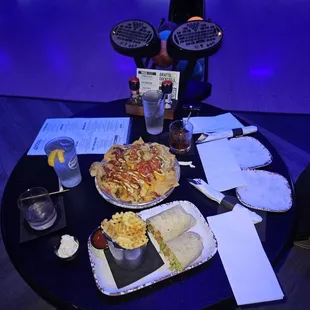 Brisket Nachos with a Caesar wrap and fries.