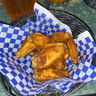 a basket of chicken wings