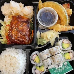 Salmon Teriyaki Bento Box with Tempura veggies and Cali Roll and Shrimp Gyoza