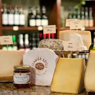 a variety of cheeses on display