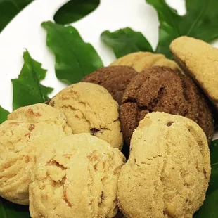 a plate of cookies and leaves
