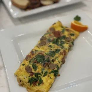 BYO Omelette with bacon, sausage and spinach