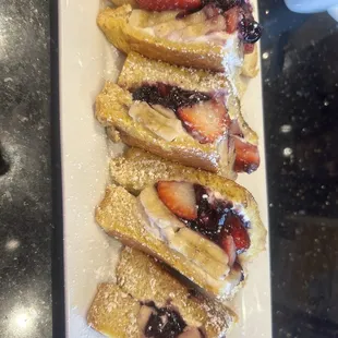 Stuffed French toast with apples, blueberries, and bananas