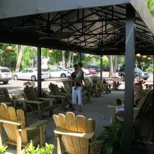 Patio with gliders and Adirondacks to relax on.