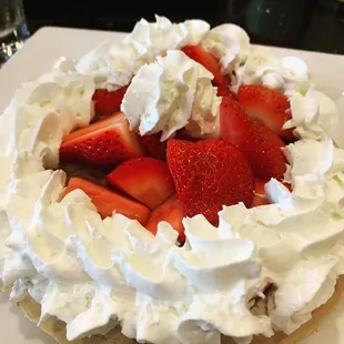Belgian Waffle with fresh strawberries and whip cream