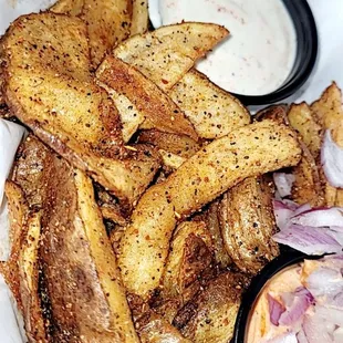 There are there seasoned potato wedges