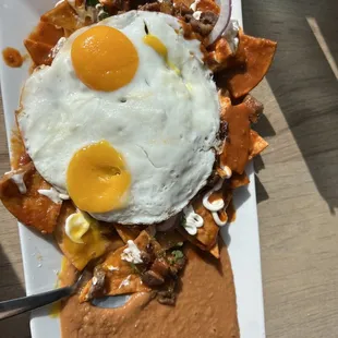 Chiliquiles with steak and egg