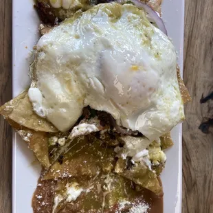 Chilaquiles with chorizo and over-easy eggs. YUM!  We are planning to go back.