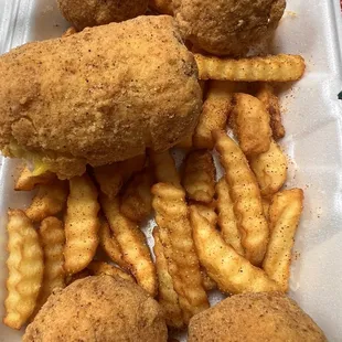 Crab ball basket with fries and a side of fried corn.