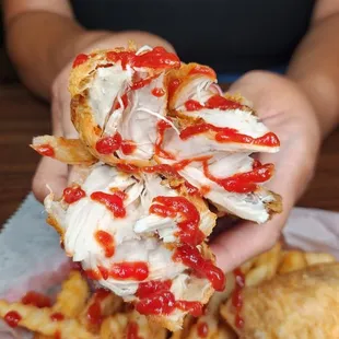 a woman holding a plate of food