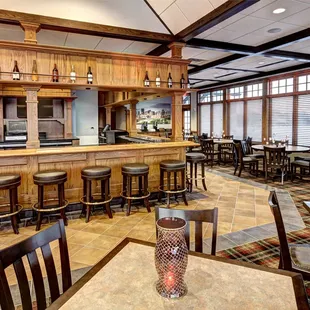 the bar and seating area of the restaurant