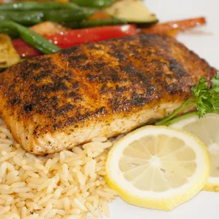 a plate of food with rice and vegetables
