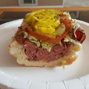 a sandwich on a paper plate