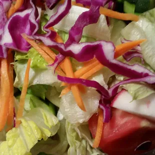 a salad in a plastic container