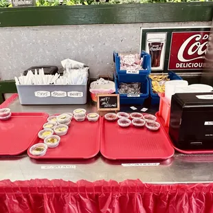 Ketchup, pickles, hot sauce counter