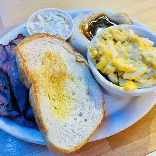 Sliced Beef with slaw, Mac and cheese, and Mashed Potatoes And Gravy
