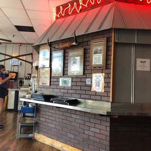 a man standing in front of the counter