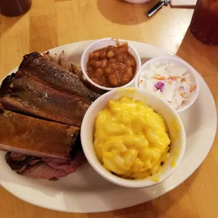 Three Meat Combo. Ribs, Roast Beef, Pulled Pork with Mac-n-cheese, coleslaw, and Baked Beans ($14.99)