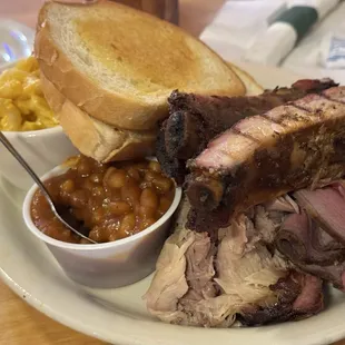 THREE MEAT COMBO - A large portion of Beef, Pulled Pork and Ribs.