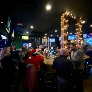 people sitting at the bar