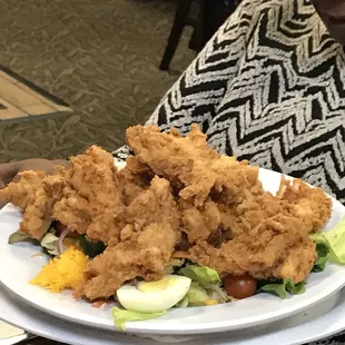 Salad with fried chicken strips...