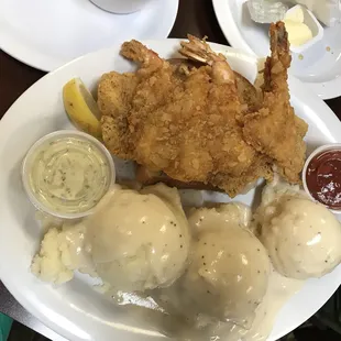 Fried fish and shrimp dinner, mashed potatoes and white gravy.