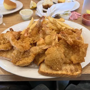 This is the Tuesday&apos;s special you get 12 fried shrimp, that are a good size and french fries and toast