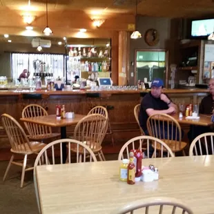 customers sitting at the bar