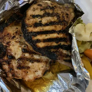 grilled chicken and vegetables in foil