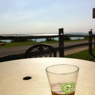 a glass of beer on a table