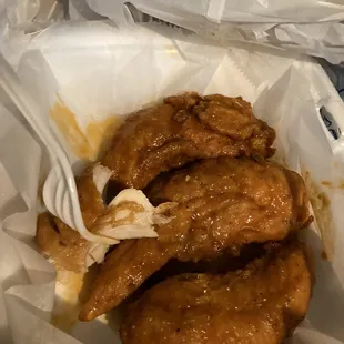 four massive chicken tenders for under $10